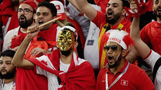Tunisia fans cheer during their World Cup game against Denmark