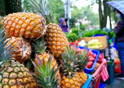 A hawker sells pineapples on the streets of Taipei following China's ban of Taiwanese pineapple imports, Taipei, Taiwan, 27 February 2021 (Photo: Ceng Shou Yi/Reuters).