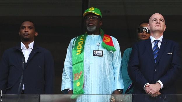 Samuel Eto'o (left) and Gianni Infantino (right) attend a Cameroon match at the World Cup