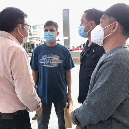 (L to R) Former lawmaker James To, who fought to free four men jailed in the Philippines on drug charges, greets three of them, Kwok Kam-wah , Chan Kwok-tung and Lo Wing-fai, at the airport on Friday after they were released in the wake of successful appeals. Leung Shu-Fook, whose appeal was unsuccessful, is still in prison. Photo: Handout 