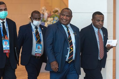 Papua New Guinea Prime Minister James Marape enters the APEC Leaders Dialogue, 19 November 2022 (Photo: Reuters/Peerapon Boonyakia).