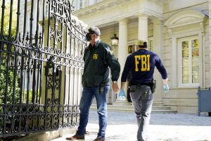 Fbi agents outside the new york city home of pamela nd Charles mcgonigal