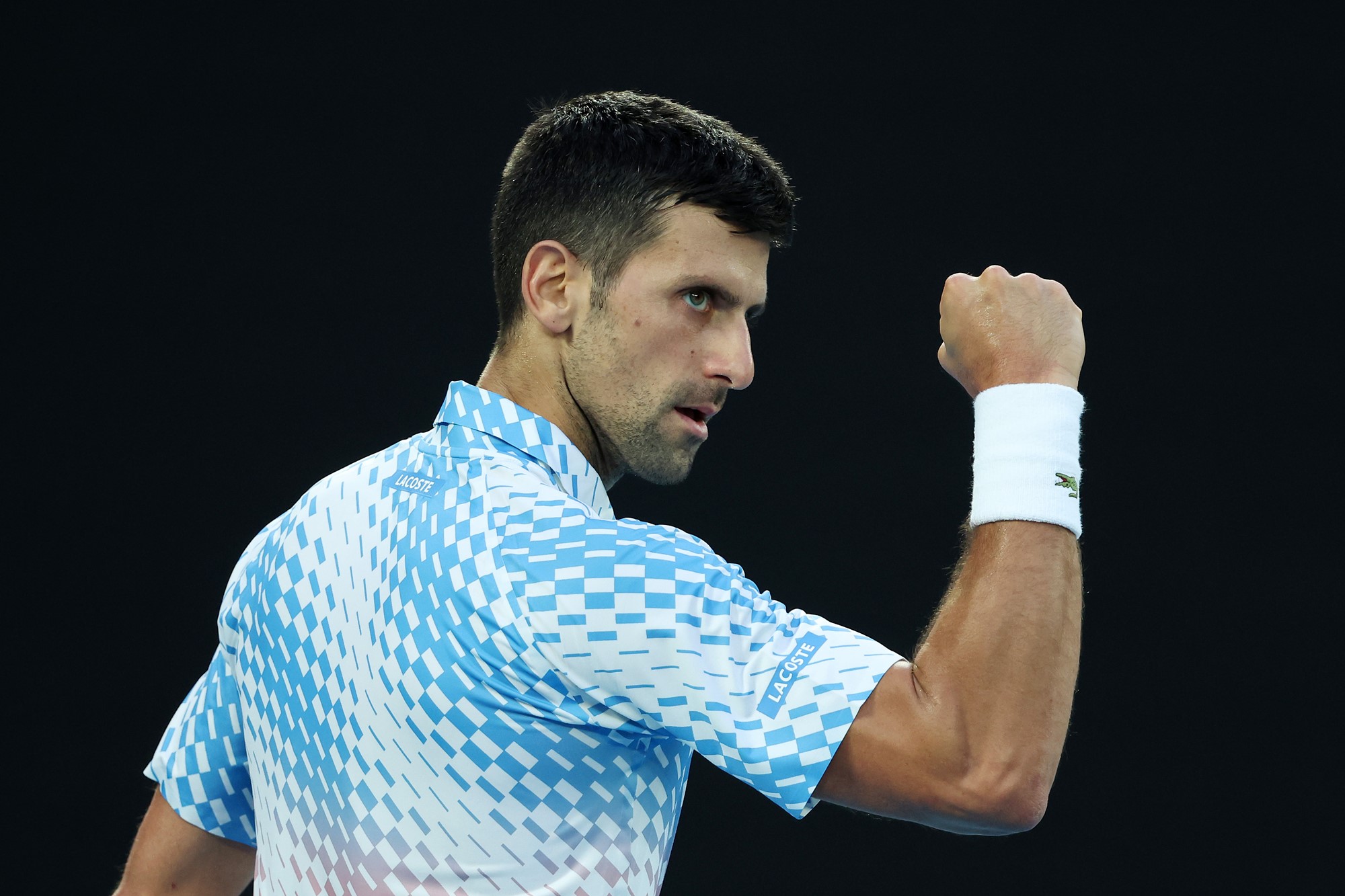 Novak Djokovic celebrates,