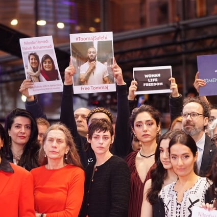 Dutch film producer Mariette Rissenbeek, centre left, US actress Kristen Stewart, centre, and Iranian-French actress Golshifteh Farahani, centre right, attend a protest with activists on the red carpet in solidarity with protesters in Iran, during the Berlin International Film Festival in Germany on Saturday. Photo: EPA-EFE