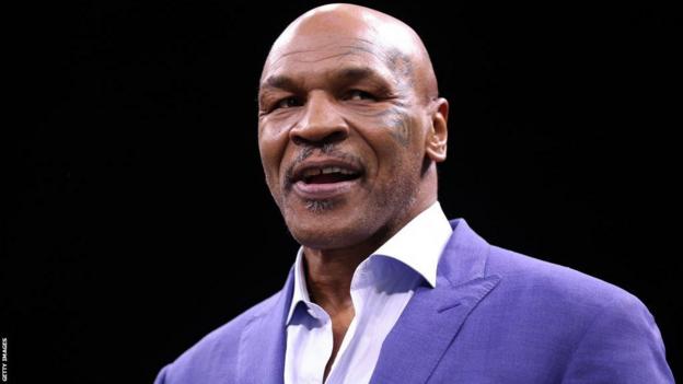 Mike Tyson watches on at Jake Paul v Tommy Fury