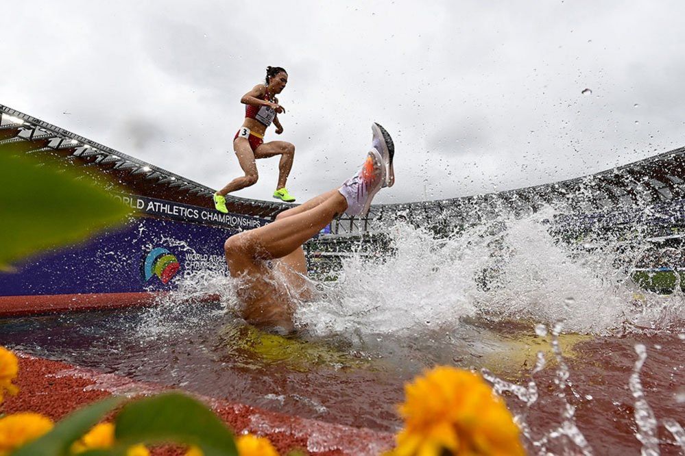 Germany's Lea Meyer (right) competes in the women's 3000m steeplechase heats during the World Athletics Championships at Hayward Field in Eugene, Oregon, 16 July 2022