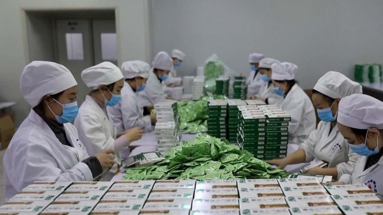 Chinese drug makers boost production of fever medicine as Covid-19 cases surge