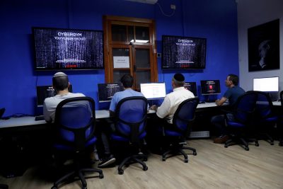 People take part in a training session at Cybergym, a cyber-warfare training facility backed by the Israel Electric Corporation, at their training center in Hadera, Israel, 8 July 2019 (Photo: Reuters/Ronen Zvulun).