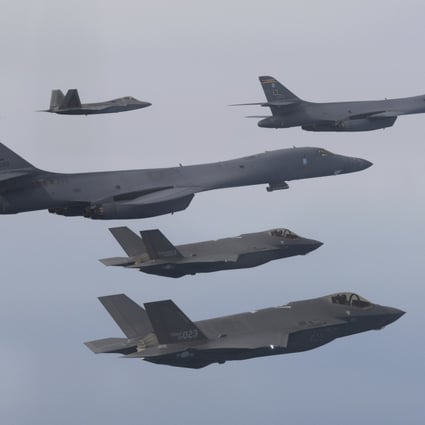 US Air Force B-1B bombers (centre), F-22 fighter jets and South Korean Air Force F-35 fighter jets (bottom) fly over South Korea during a joint air drill on January 1. On February 2, North Korea threatened the “toughest reaction” to the US’ expanding joint military exercises with South Korea to counter the North’s growing nuclear weapons ambitions, claiming that the allies were pushing tensions to an “extreme red line”. Photo: South Korean Defence Ministry via AP