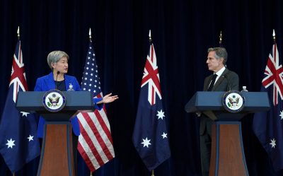 Australian Foreign Minister Penny Wong gestures to US Secretary of State Antony Blinken during a news conference at AUSMIN consultations in Washington, US, 6 December 2022 (Photo: Reuters/Kevin Lamarque).