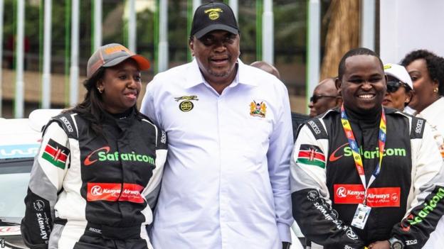 Maxine Wahome with former Kenyan President Uhuru Kenyatta and her navigator at last year Safari Rally
