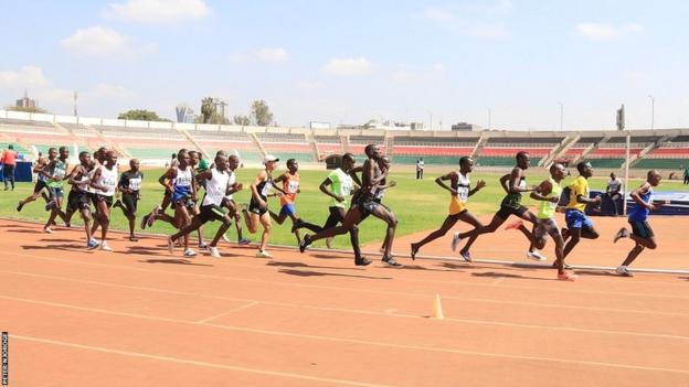 Runners at a track meet in Kenya