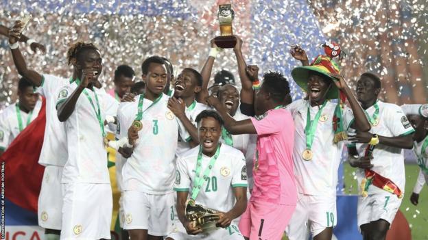 Senegal under-20 players lift the Afcon U20 trophy