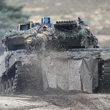 A Leopard 2 tank undergoes drills at the Bundeswehr tank battalion 203 at the Field Marshal Rommel Barracks in Augustdorf, Germany, on February 1. An independent Sweden-based watchdog says world military spending has grown for the eighth consecutive year to an all-time high of US$2.24 trillion, with 13 per cent of the rise taking place in Europe, chiefly because of Russian and Ukrainian spending. Photo: AP