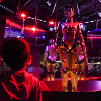 A child gazes at a robot at an exhibition on humanoid robots at the Science Museum in Tsim Sha Tsui, in November 2020. More recently, ChatGPT, an artificial intelligence platform that returns humanlike responses to questions, has taken the world by storm. Photo: Winson Wong
