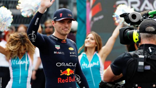Max Verstappen of the Netherlands and Oracle Red Bull Racing walks out onto the grid prior to the F1 Grand Prix of Miami
