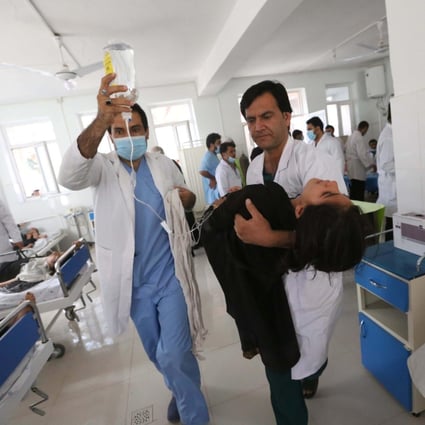 An Afghan school girl receives hospital treatment after being admitted for symptoms of poisoning, in Herat, Afghanistan in 2015. On Sunday, nearly 80 girls were poisoned and hospitalised in two separate attacks at their primary schools in northern Afghanistan, a local education official said. Photo: EPA