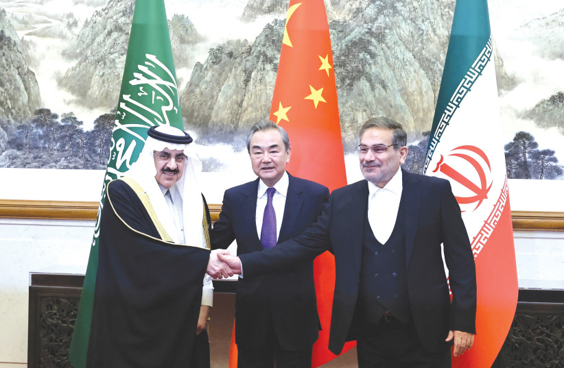  CHINA’S TOP diplomat, Wang Yi, flanked by senior security officials of Iran and Saudi Arabia, announces that the two countries have agreed to restore diplomatic relations, in Beijing, earlier this month. (credit: CHINA DAILY VIA REUTERS)