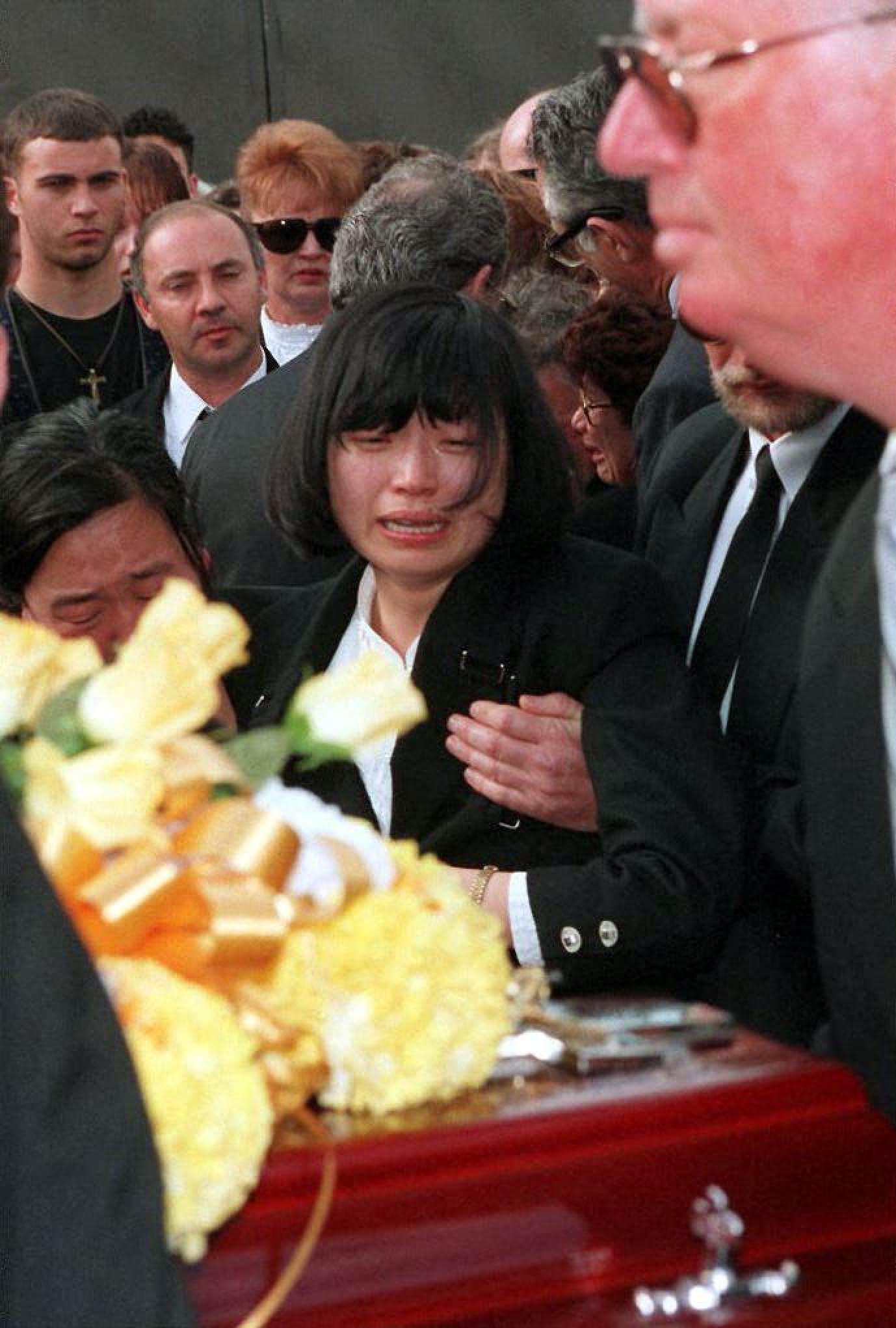 John Newman was killed in front of his fiance Lucy Wang (above), who was unable to identify the shooter or getaway car. Photo: AFP