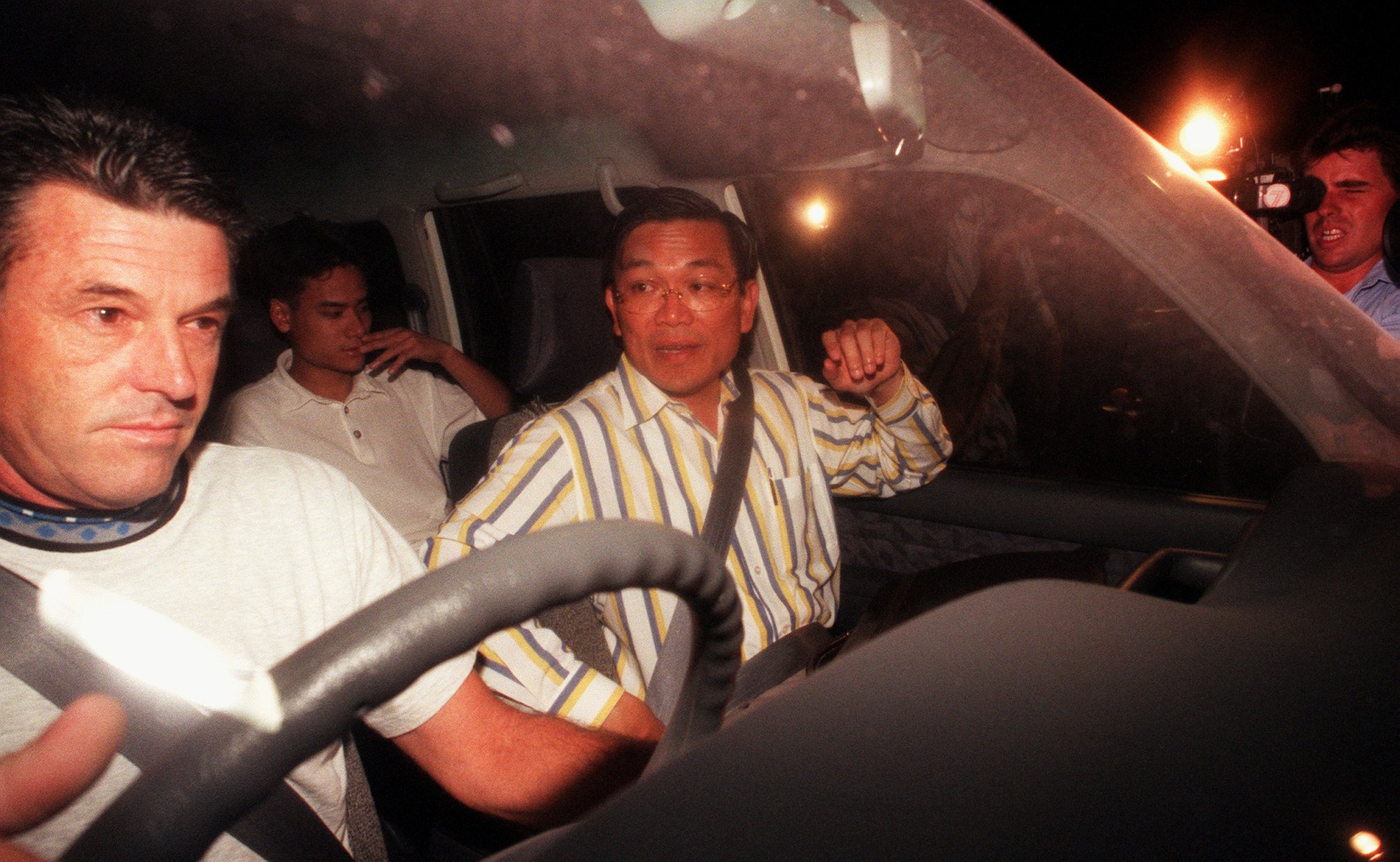 Ngo arrives at Parramatta police station in 1998 to be charged with the first-degree murder of Newman. Photo: Getty Images