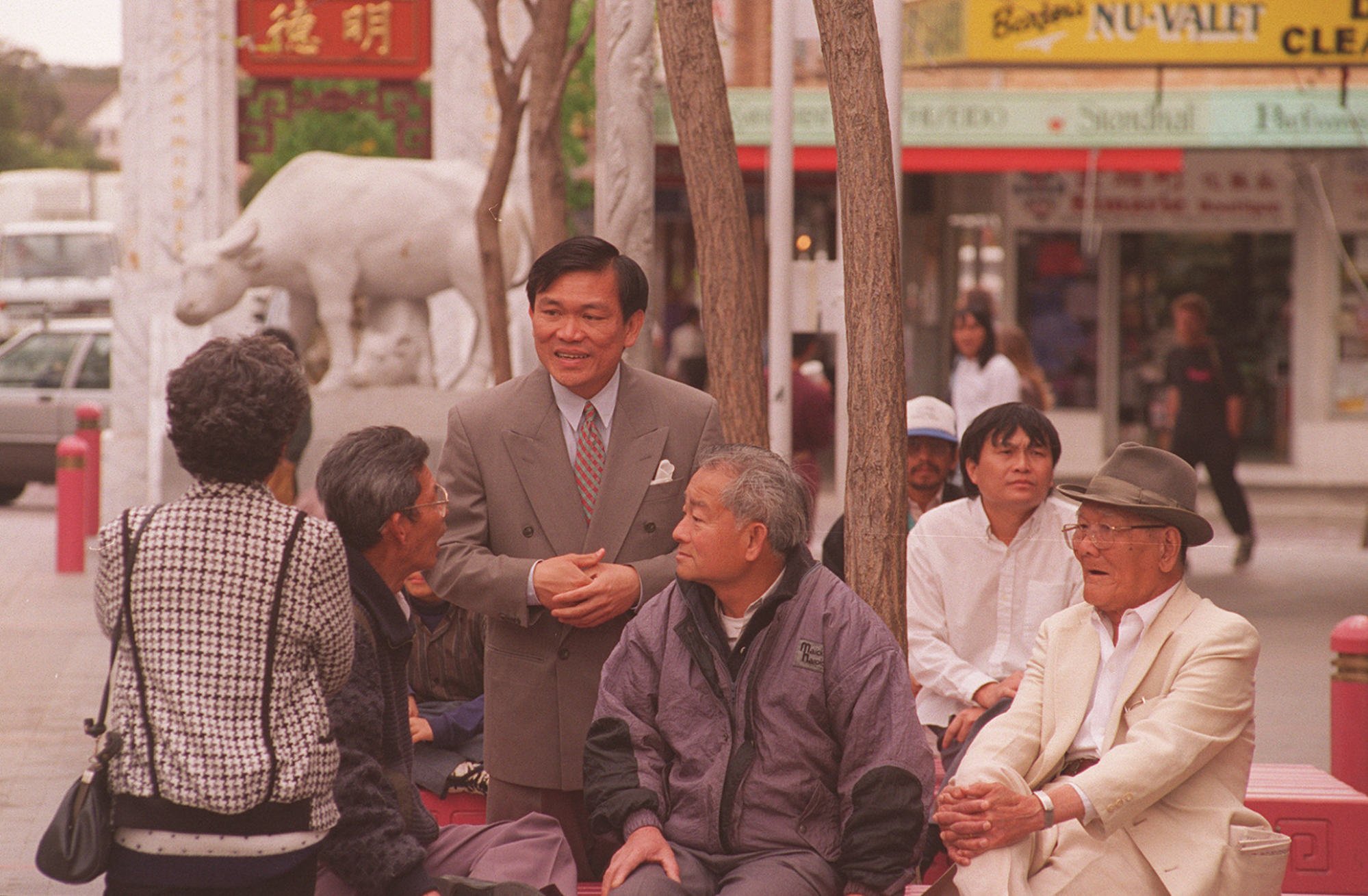 Ngo chats to locals at Cabramatta’s Freedom Plaza in September 1994. Photo: Getty Images