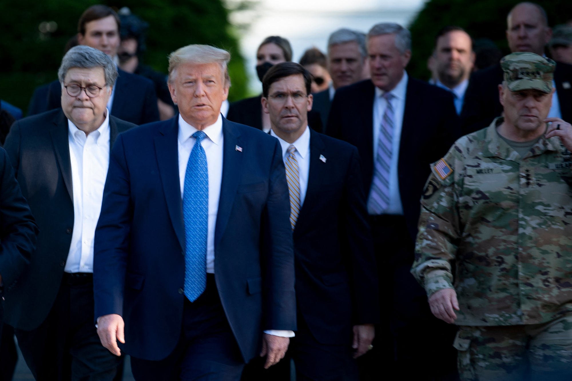 General Mark Milley (right), Donald Trump and others from the White House visit St John’s Church after the area was cleared of protesters in 2020. File photo: AFP