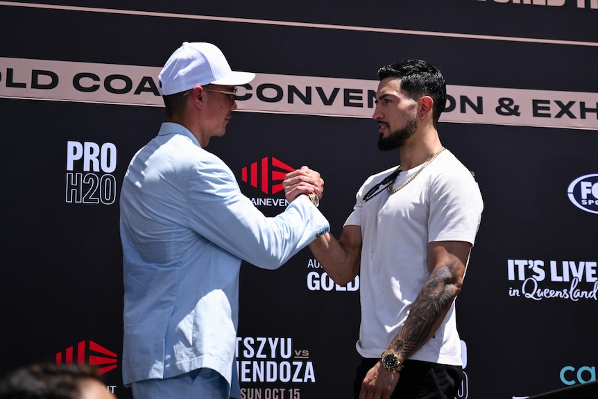 Tim Tszyu and Brian Mendoza shake hands
