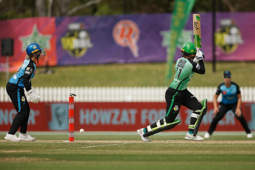 The ball hits the stumps and the bails are disloged with Rhys McKenna's foot still in her crease