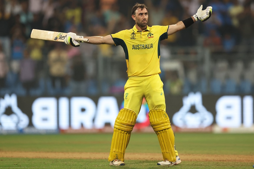 Glenn Maxwell celebrates hitting the winning runs for Australia against Afghanistan at the Cricket World Cup.
