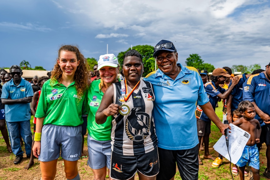 Jodie Palipuaminni holds up the best-on-ground-medal after the match.