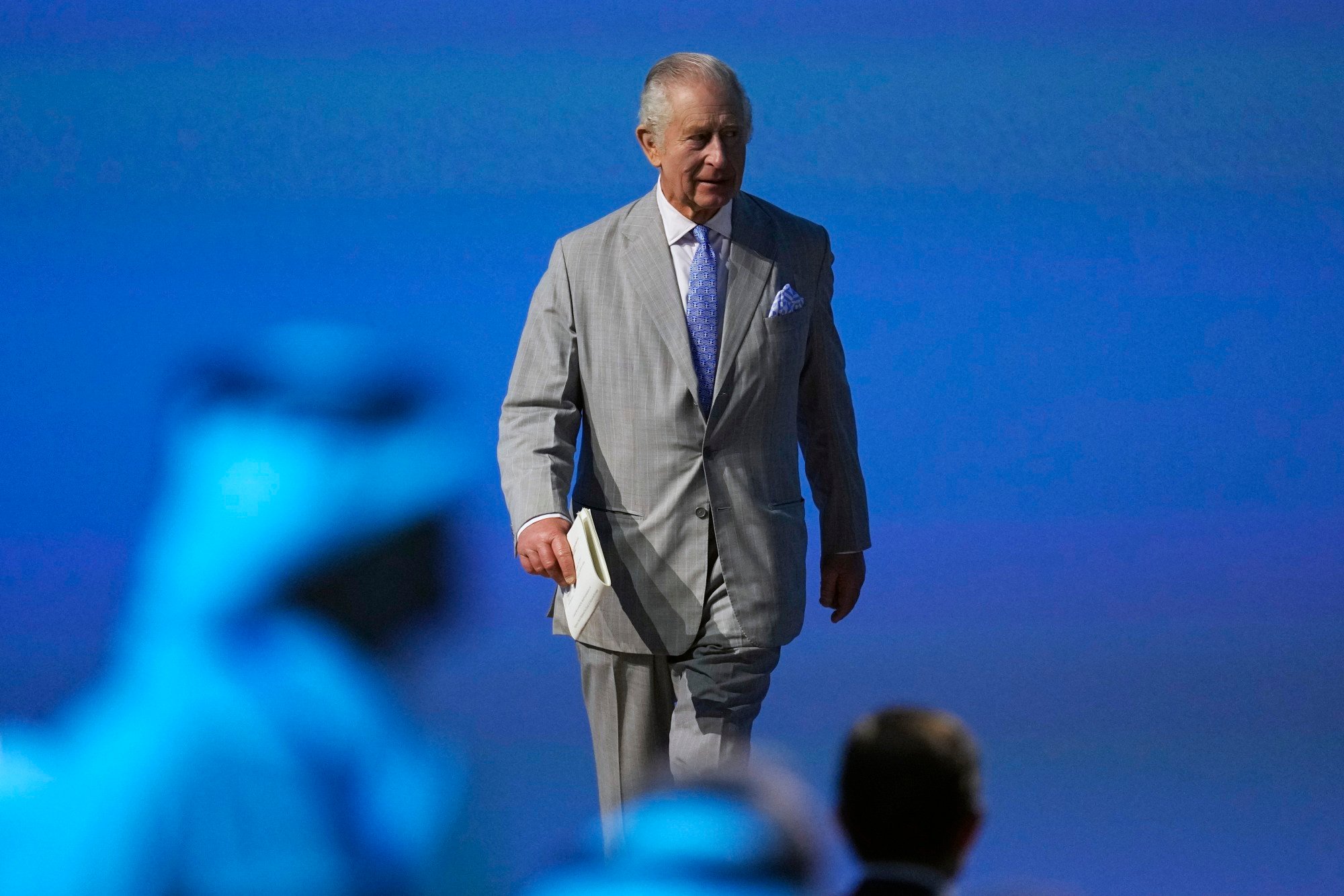 Britain’s King Charles III walks through the opening at the Cop28 summit in Dubai, United Arab Emirates. Photo: AP