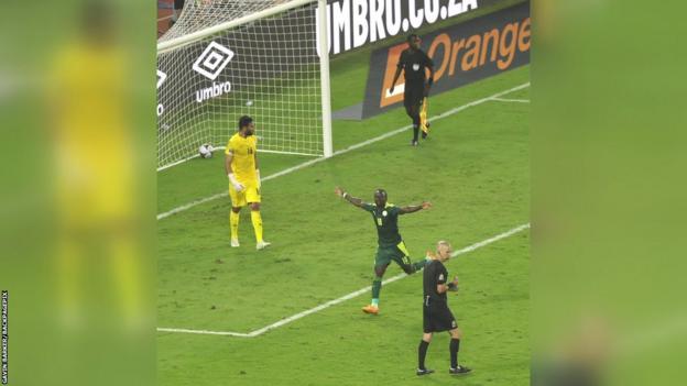 Sadio Mane celebrates his penalty shoot-out goal that earned Senegal their first Africa Cup of Nations triumph, winning the 2021 edition