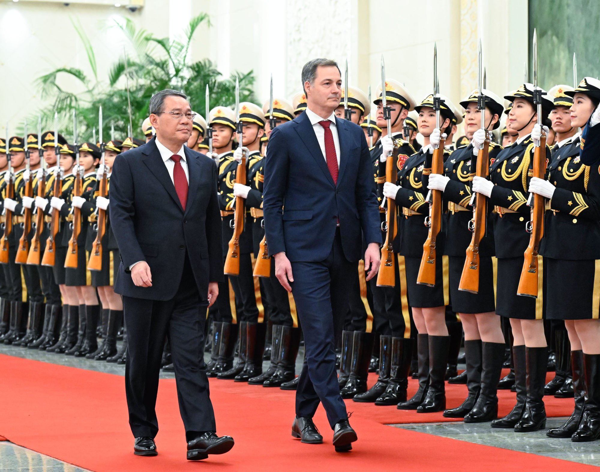 Chinese Premier Li Qiang escorts De Croo in a welcoming ceremony in the Great Hall of the People prior to their talks on Friday. Photo: Xinhua