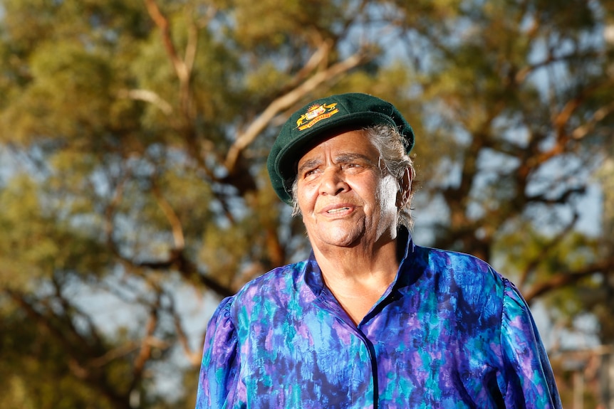 Former Australian Test cricketer Aunty Faith Thomas wearing her baggy green.