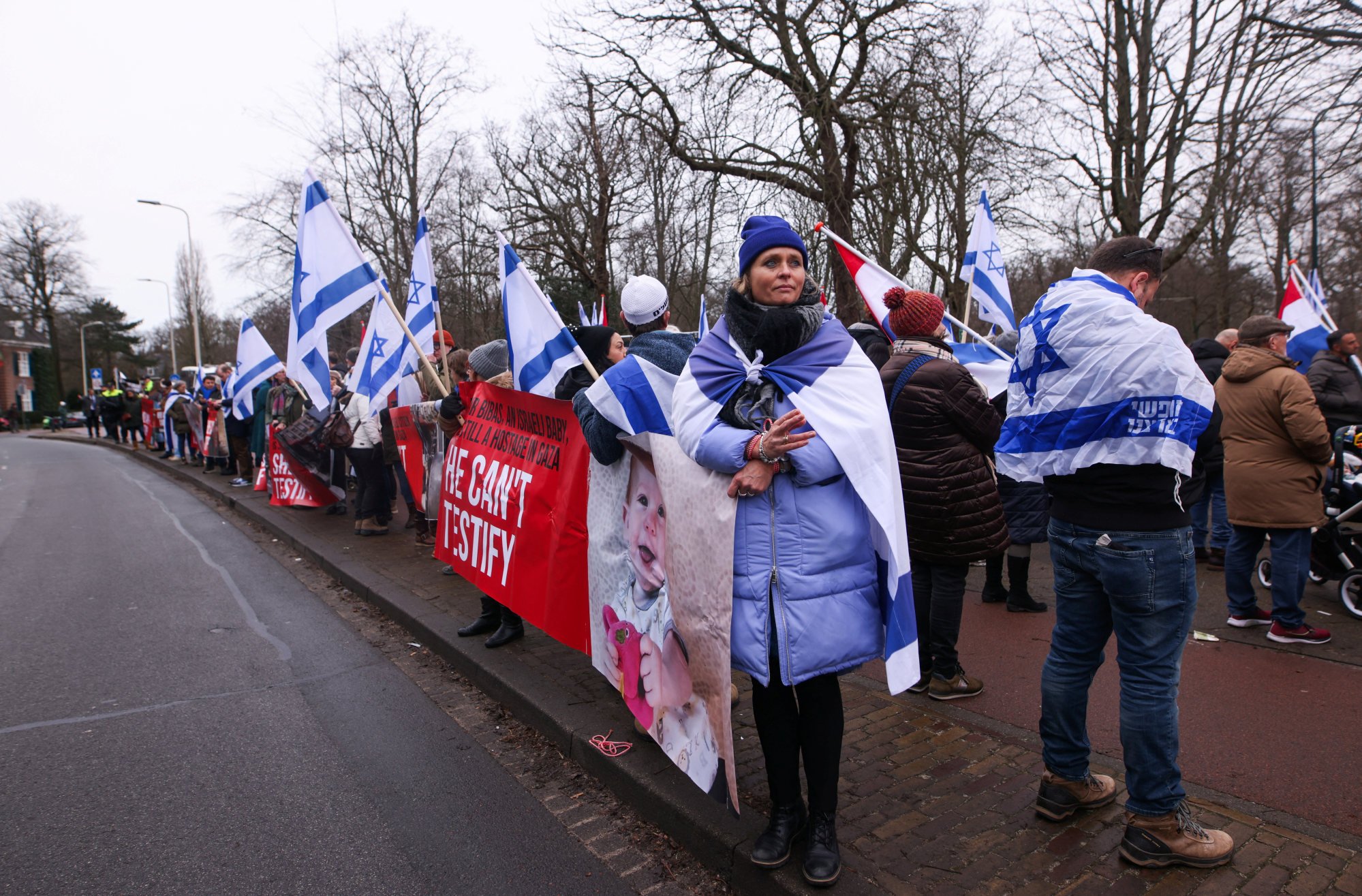 Pro-Israeli protesters gather near the International Court of Justice on January 12 as judges hear a request for emergency measures by South Africa to order Israel to stop its military actions in Gaza. Photo: Reuters