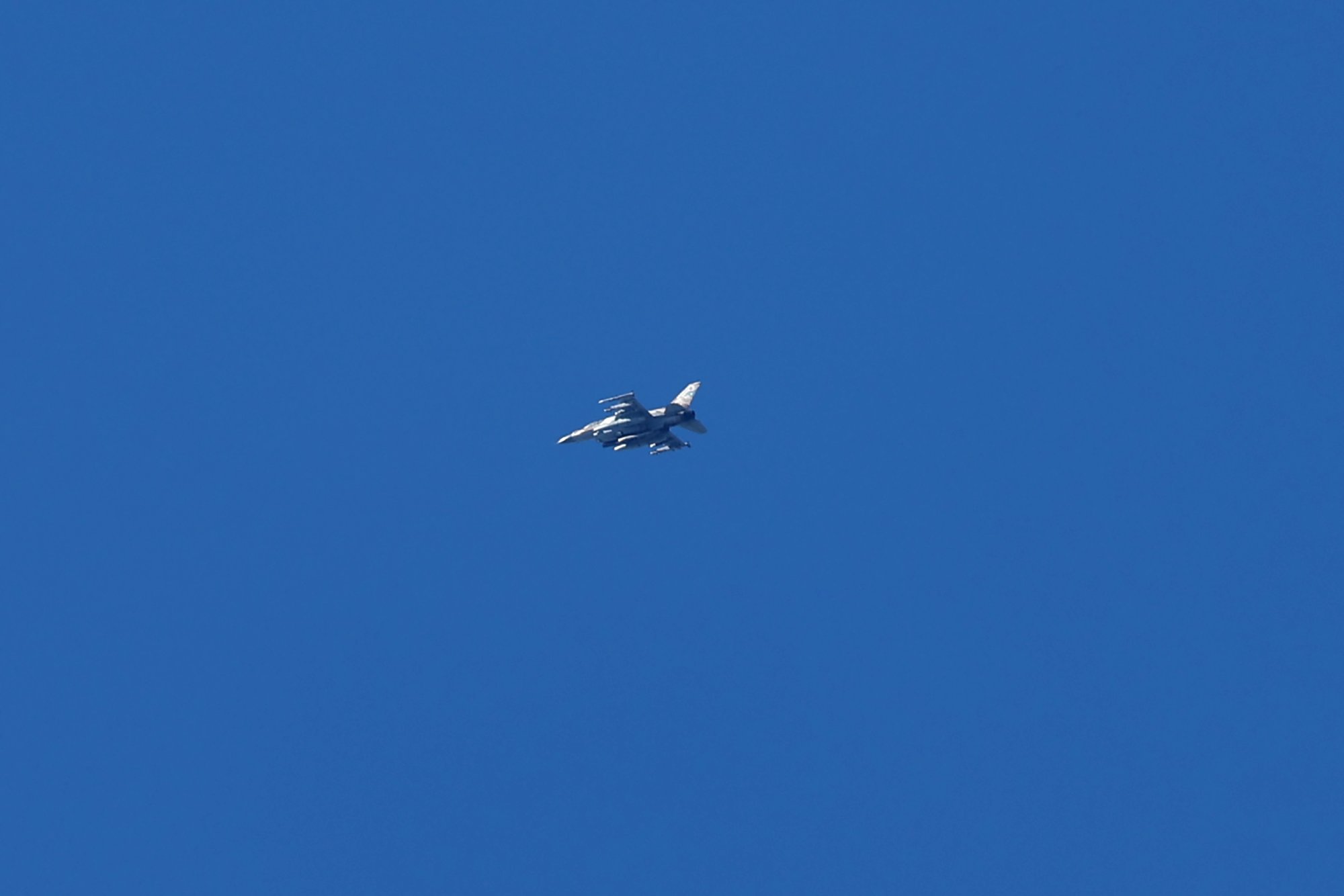 An Israeli fighter jet flies over an area near the Lebanon-Israel border, as seen from northern Israel on Saturday. Israel said it had struck terrorist targets in southern Lebanon. Photo: EPA-EFE
