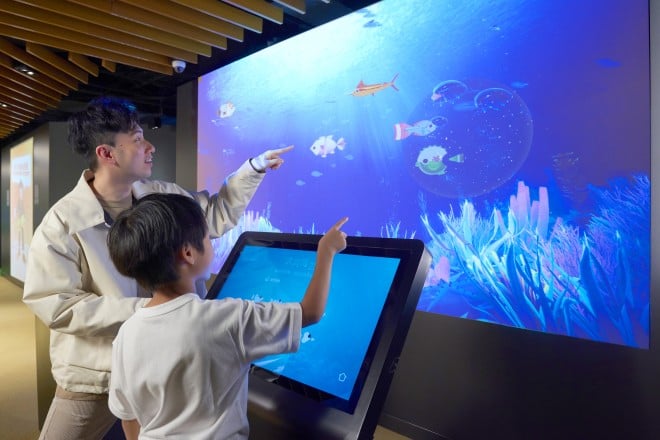 Visitors can learn about the unique cultural characteristics of the 12 different ethnic groups represented by the fishes with the Great One Ocean interactive game.