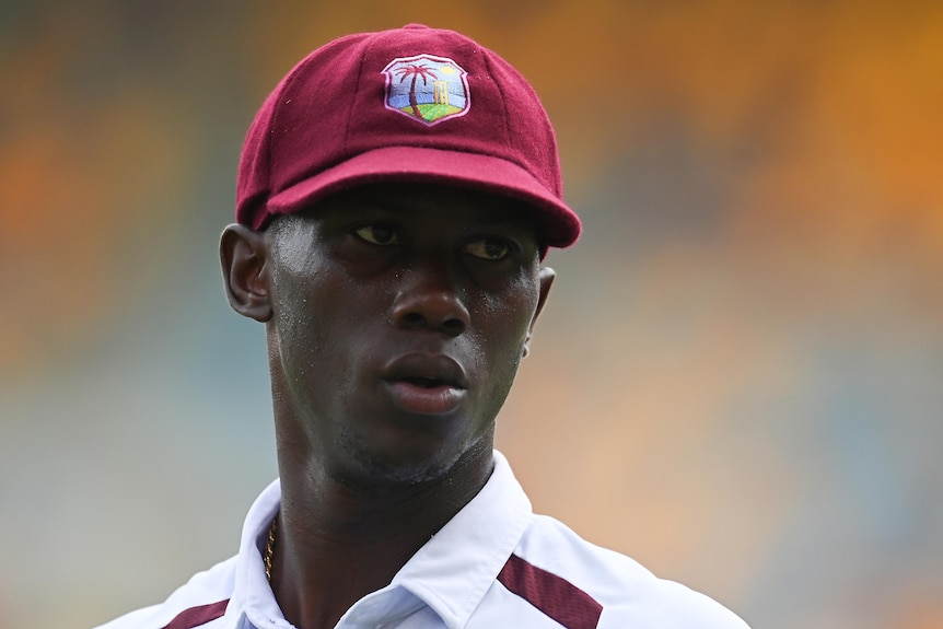 Shamar Joseph looks out from under his cap