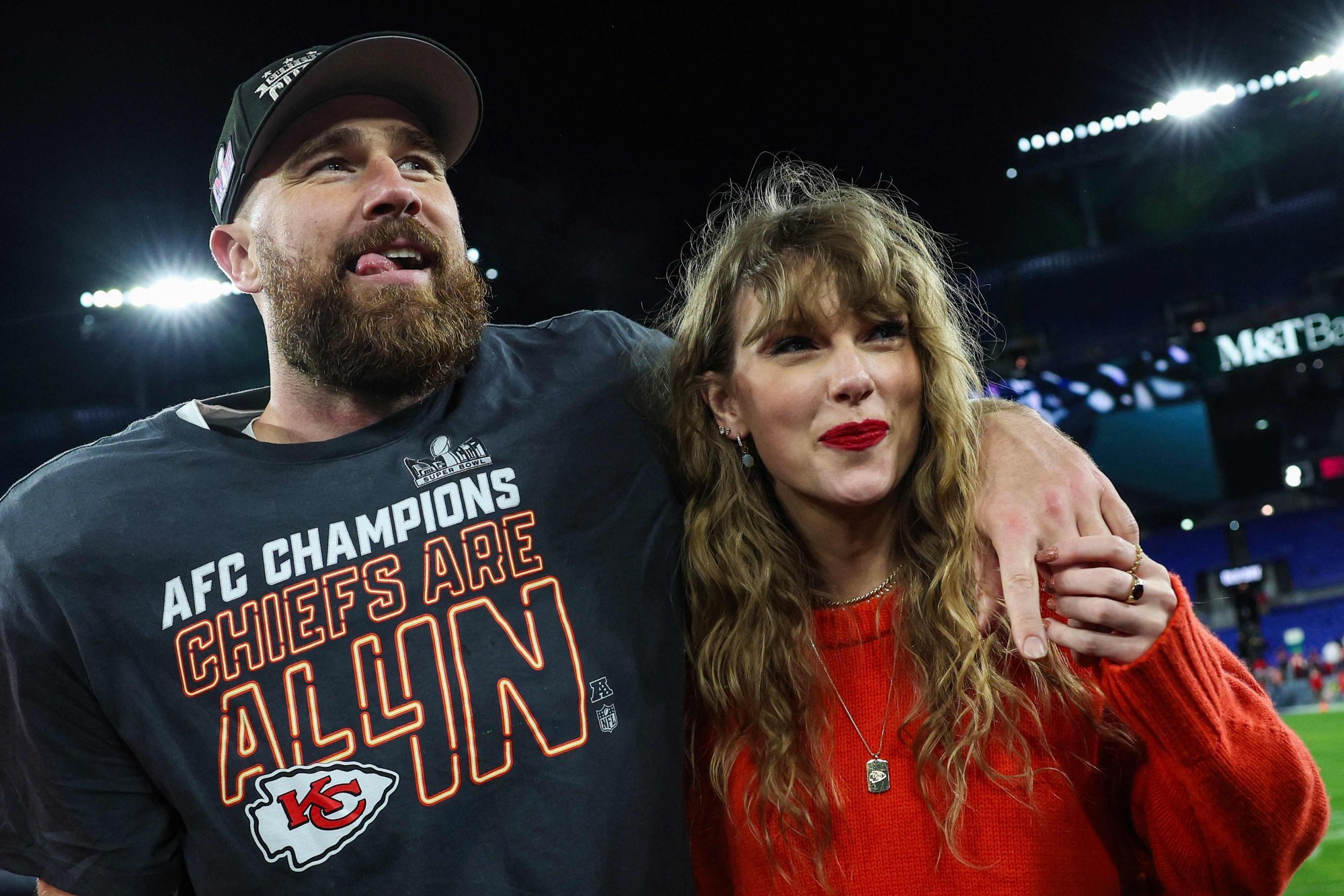 Travis Kelce of the Kansas City Chiefs celebrates with Taylor Swift after a 17-10 victory against the Baltimore Ravens in the AFC Championship Game at M&T Bank Stadium in Baltimore on Sunday. Photo: TNS