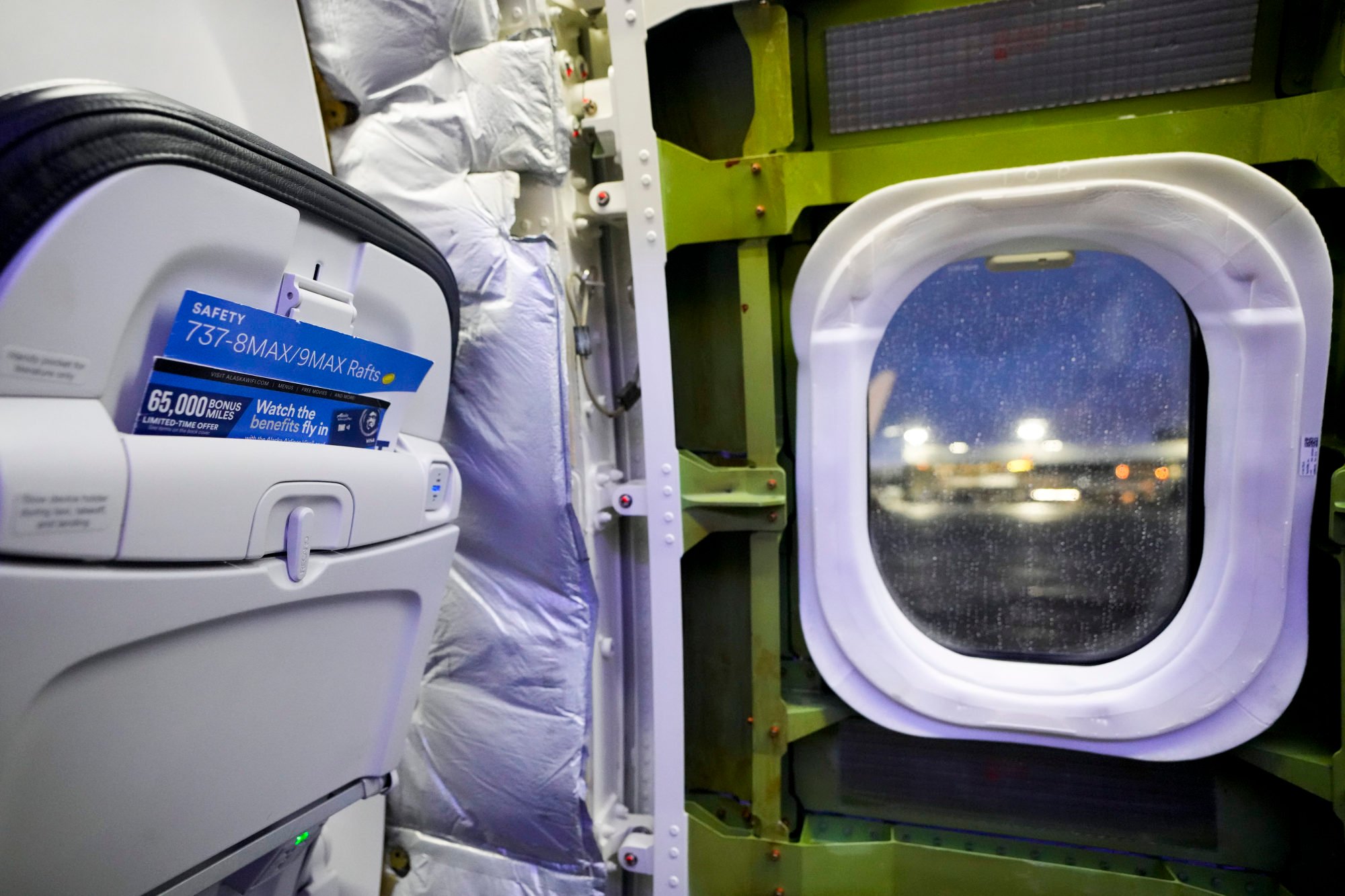 A door plug area of an Alaska Airlines Boeing 737 Max 9 aircraft awaiting inspection is pictured with panelling removed at the airline’s facilities at Seattle-Tacoma International Airport on Wednesday. Photo: AP