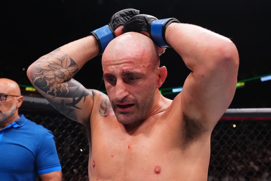 A man looks dejected after a fight.