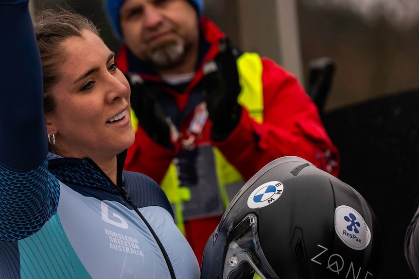 Bree Walker holds up her hand and smiles