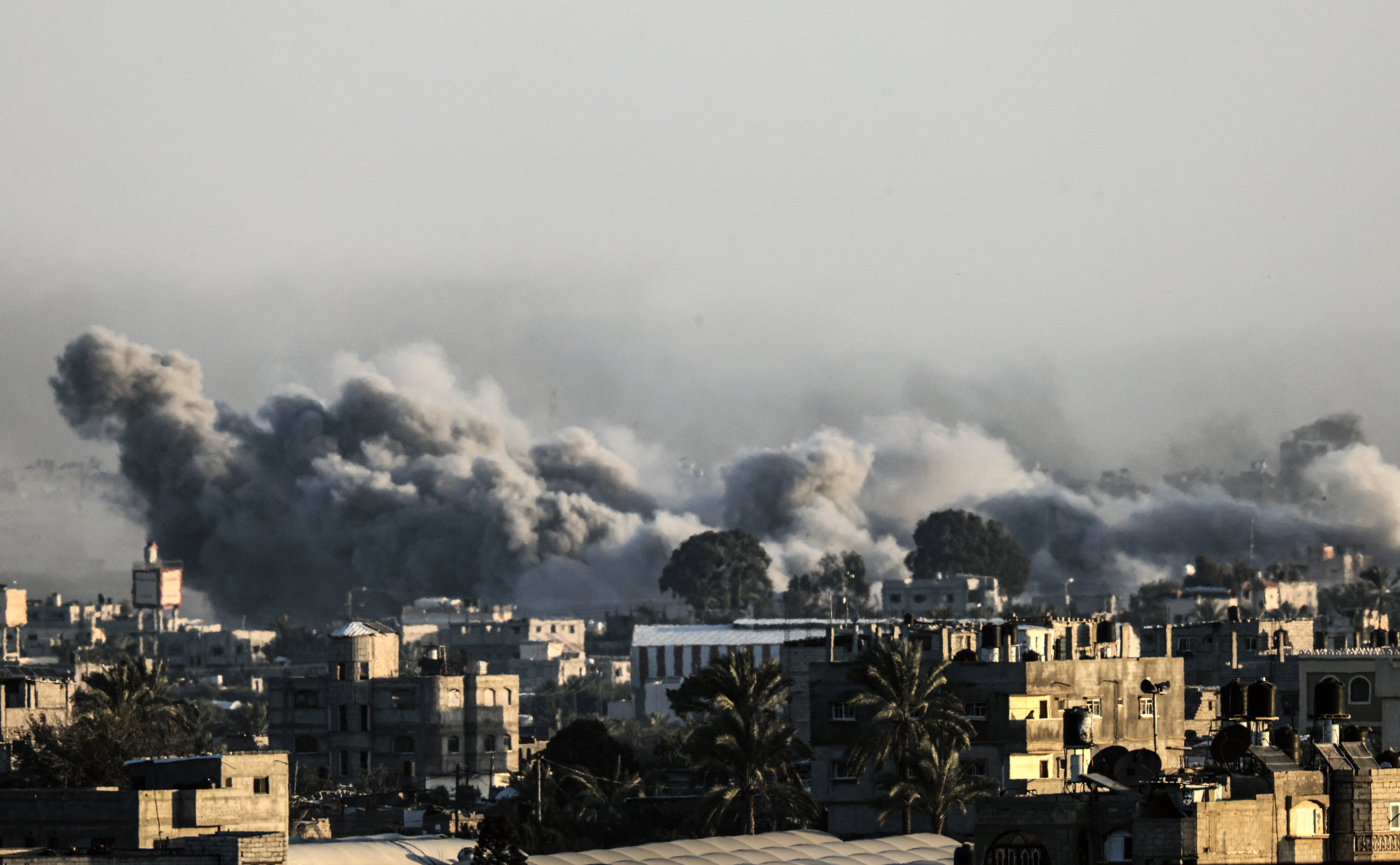 Smoke billows during an Israeli bombardment over Khan Yunis in the southern Gaza Strip on January 22, 2024