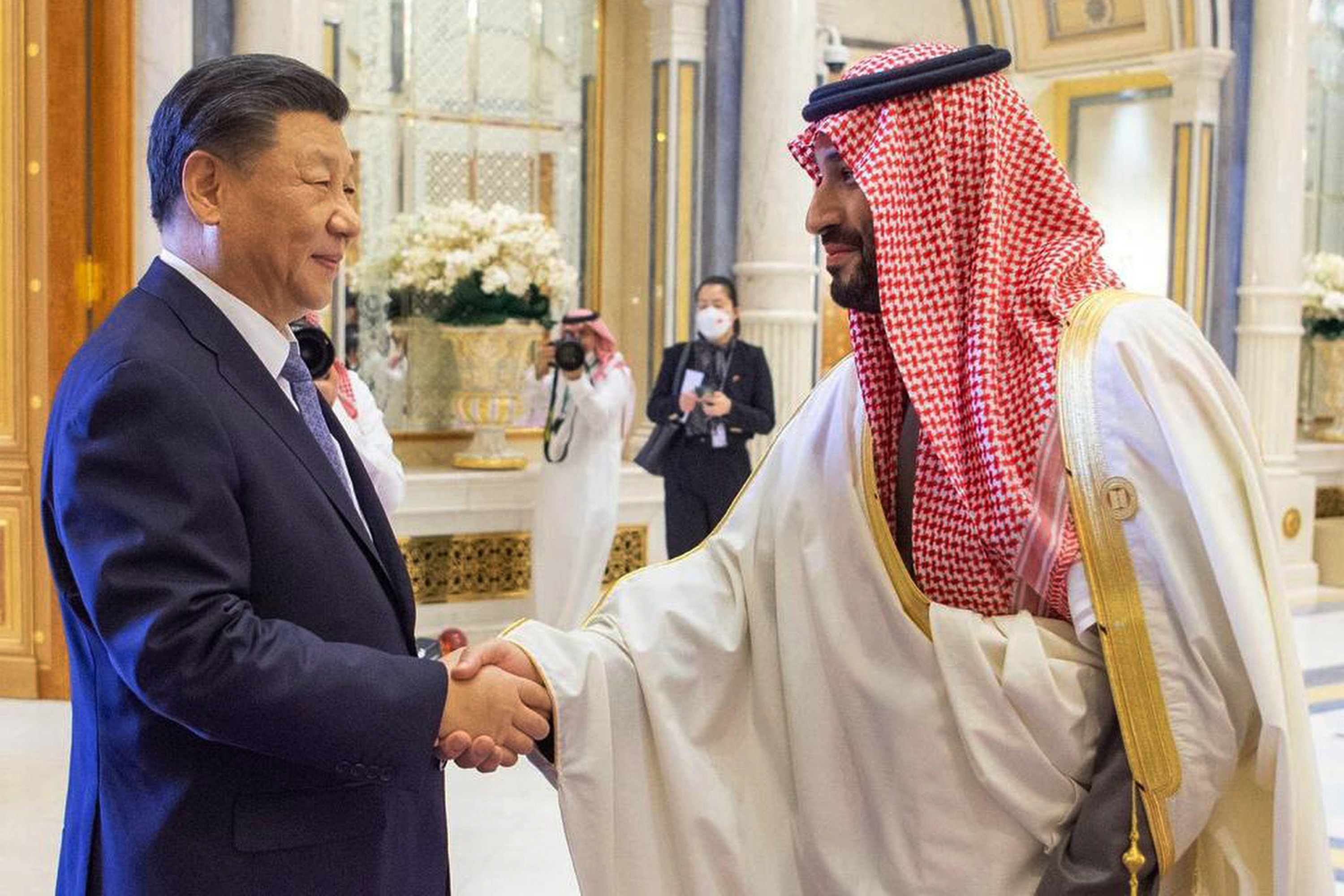 Chinese President Xi Jinping (left) shakes hands with Saudi Crown Prince Mohammed bin Salman (right) at the Gulf Cooperation Council (GCC) Summit in Riyadh, Saudi Arabia in 2022