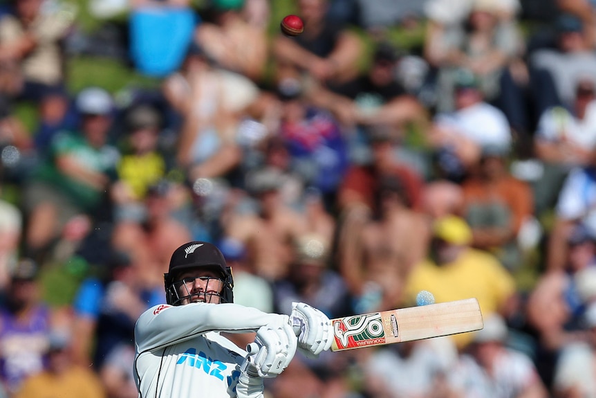 Tom Blundell hits the ball