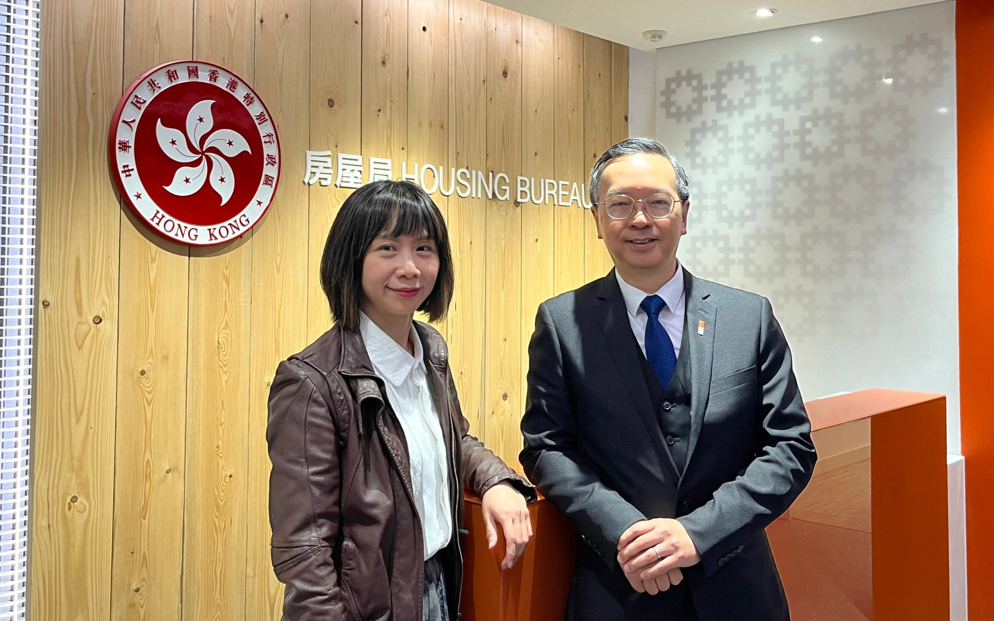 Deputy housing secretary Winnie Wong (left) and Undersecretary for Housing Victor Tai have backed the “punishment and reward” system for the operator of the Yuen Long site. Photo: Edith Lin