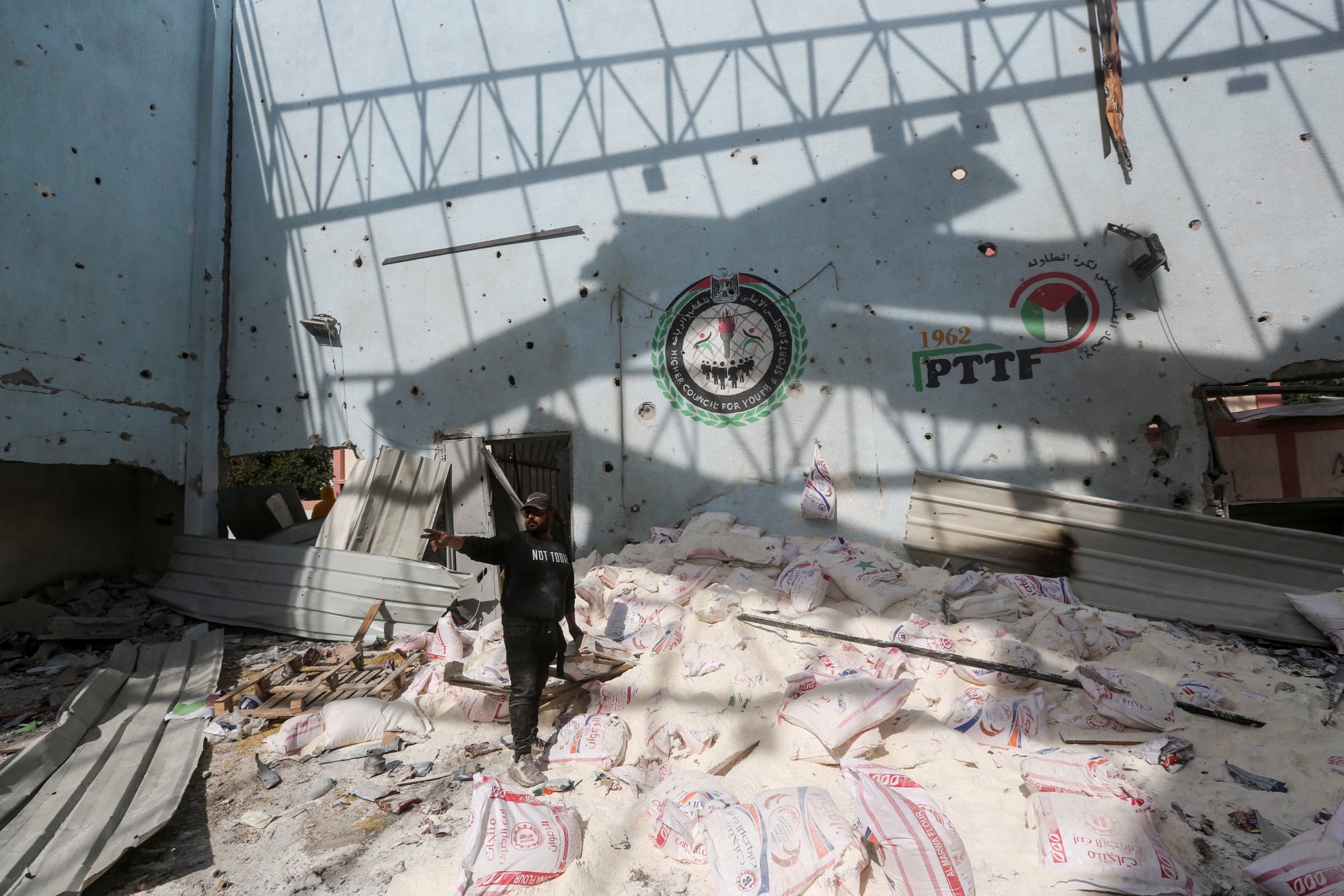The site of an Israeli strike on an aid warehouse in Al-Nuseirat refugee camp in the central Gaza Strip on Thursday. Photo: Reuters