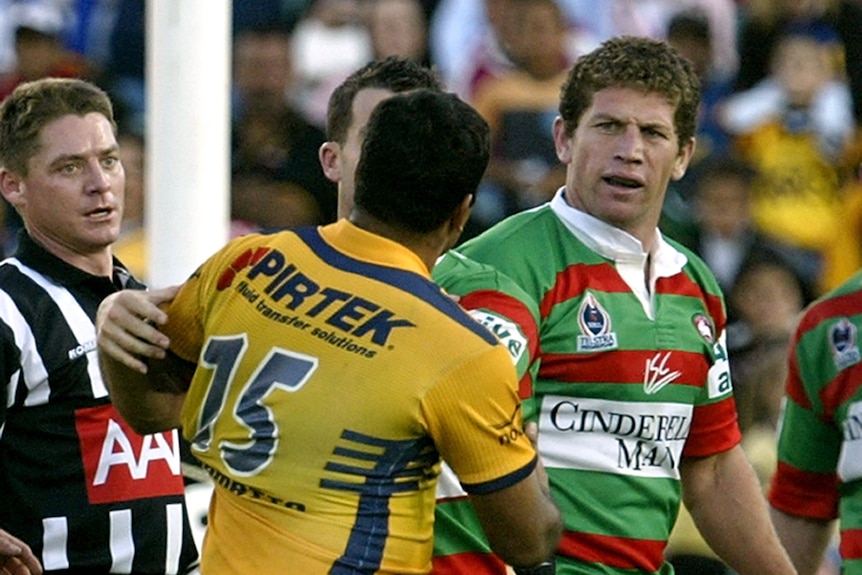 South Sydney's Bryan Fletcher looks at Parramatta Eels' Dean Widders during an NRL game in 2005.