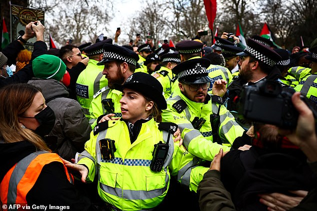Pro-Palestine protests have cost the Met Police £32.2 million so far as thousands more marchers are set to take to London streets this weekend. Pictured:&nbsp;Police officers during a Pro-Palestinian demonstration on January 6, 2024