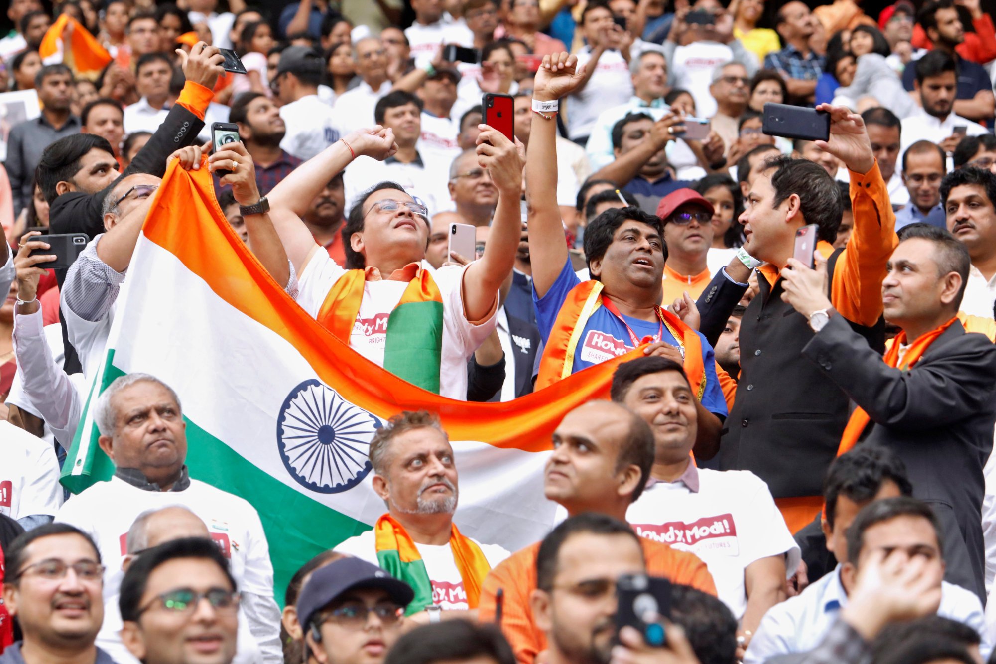 US-based supporters hold Indian flags during a “Howdy, Modi” rally celebrating Indian Prime Minister Narendra Modi at NRG Stadium in Houston, Texas in 2019. Photo: Reuters
